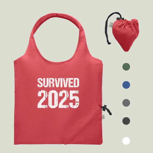 Faltbare Einkaufstasche „Survived 2025“ – robust, witzig & nachhaltig