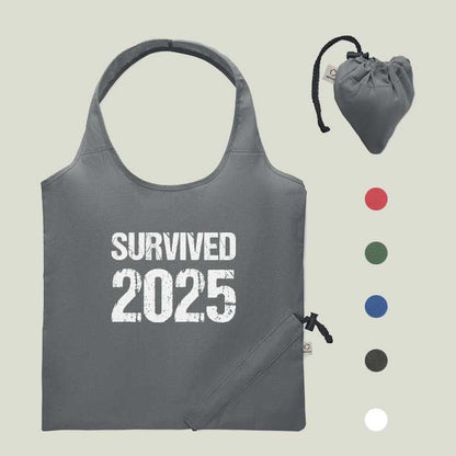Faltbare Einkaufstasche „Survived 2025“ – robust, witzig & nachhaltig